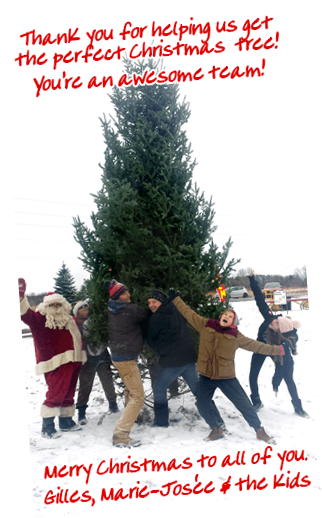 Photo or a family with Santa and their giant, new Christmas tree from Fallowfield Tree Farm.